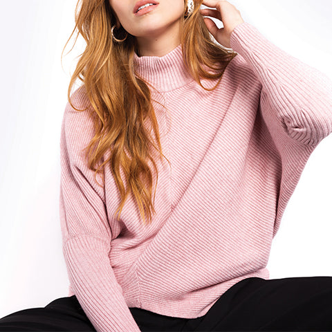 Shop for stunning European style Designer sweaters and tops 