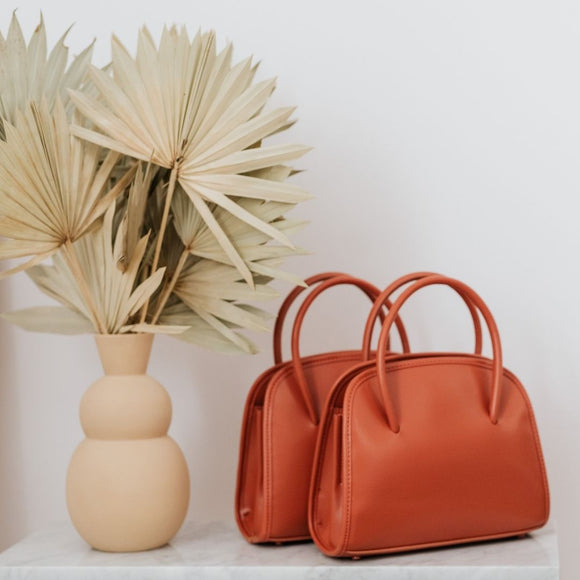 Shop the latest styles of handbags, ladies' bags & purses from Ema&Carla