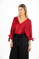 WOMEN'S WOVEN DELICATELY OVERSIZED V-NECK BAT-WING LONG SLEEVE TOP, WITH SELF-TIE RIBBONS AT SLEEVE CUFFS