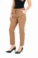 WOMEN'S WOVEN PULL ON PANTS, WITH A DRAW CORD AT THE WAIST FOR ADJUSTABILITY, A TAPERED LEG AND FRONT SLASH POCKETS