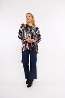 Women’s Knit Long Sleeve Tunic. Composition: 55% Viscose, 40% Polyester and 5% Elastane. 