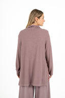 WOMEN'S COWL-NECK LONG SLEEVE TUNIC, WITH LOOSE FLAP PANELS AT THE SIDE SEAMS. A COMBINATION OF SOLID KNIT AND PRINTED WOVEN MATERIALS
