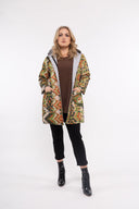 Women’s Knit Long Sleeve Coat. Composition: 60% Viscose, 35% Polyester and 5% Elastane. 