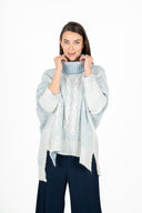 WOMEN'S KNIT OVERSIZED TURTLE-NECK SWEATER, WITH LONG BAT-SLEEVES, A DROPPED SHOULDER AND A CABLE KNIT DETAIL DOWN THE FRONT