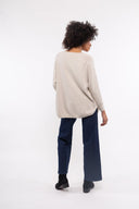 Women’s Knit Long Sleeve Sweater. Composition: 50% Viscose, 28% Polyamide, 12% Wool and 10% Angora. 