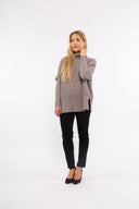 Women’s Knit Long Sleeve Sweater. Composition: 56% Viscose, 28% Polyester and 16% Polyamide. 