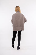 Women’s Knit Long Sleeve Sweater. Composition: 56% Viscose, 28% Polyester and 16% Polyamide. 