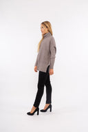 Women’s Knit Long Sleeve Sweater. Composition: 56% Viscose, 28% Polyester and 16% Polyamide. 